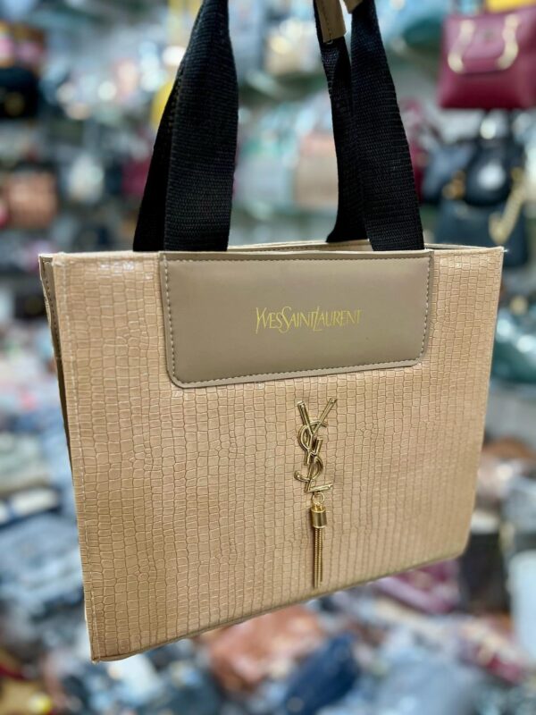 Luxury women's light beige handbag with detachable strap