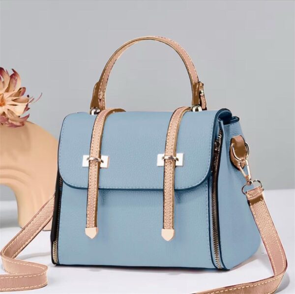 Elegant faux leather handbag with shoulder strap